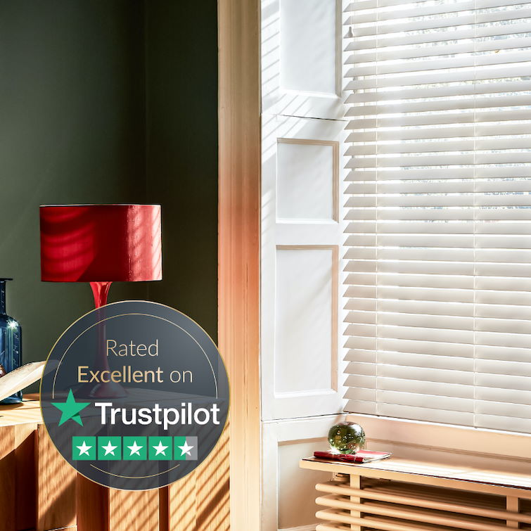 image of green living room with red lamp next to white blinds with excellent trustpilot review 