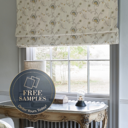 What materials are cream Roman blinds available in?