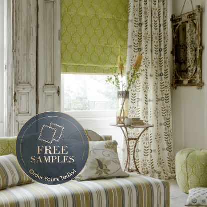 What materials are green Roman blinds available in?