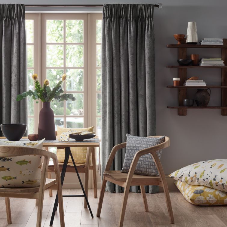 image to show example of pencil pleat curtains being used in the home 