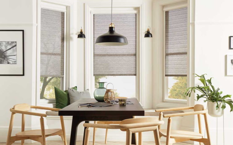 Image of brown table infront of window with perfect fit blinds 
