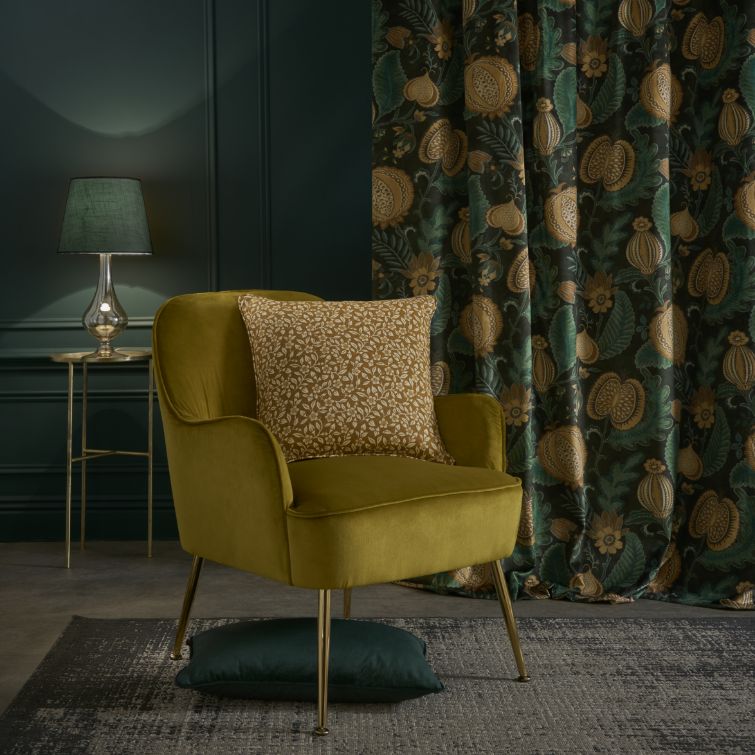 image of green themed room with a textured chair infront of a green thermal curtain 
