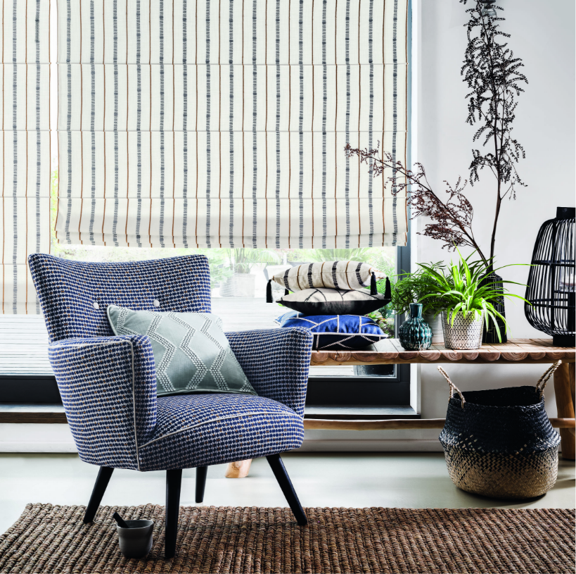 Close up image of window with kitchen blinds attached